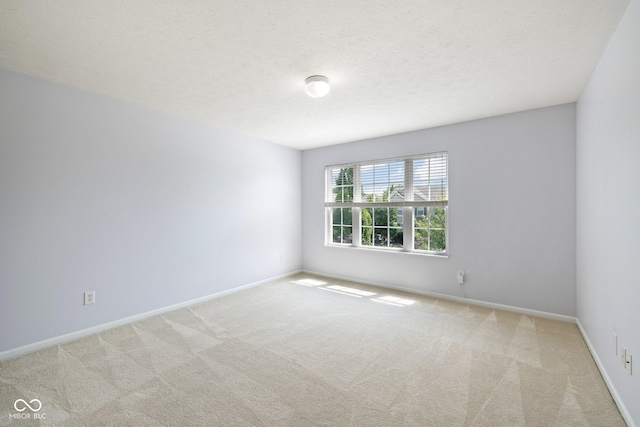 12997 Bartlett Dr, Fishers, IN 46037 - carpeted empty room with baseboards