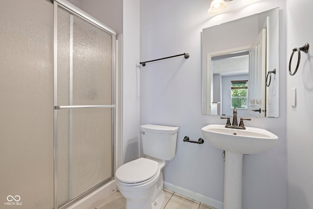 12997 Bartlett Dr, Fishers, IN 46037 - bathroom featuring a stall shower and tile patterned floors