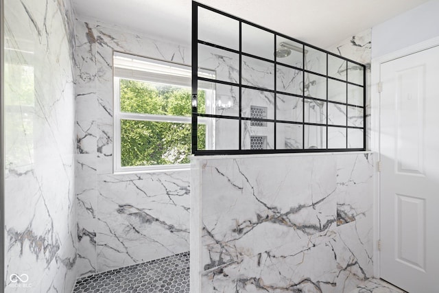 12997 Bartlett Dr, Fishers, IN 46037 - bathroom featuring a marble finish shower