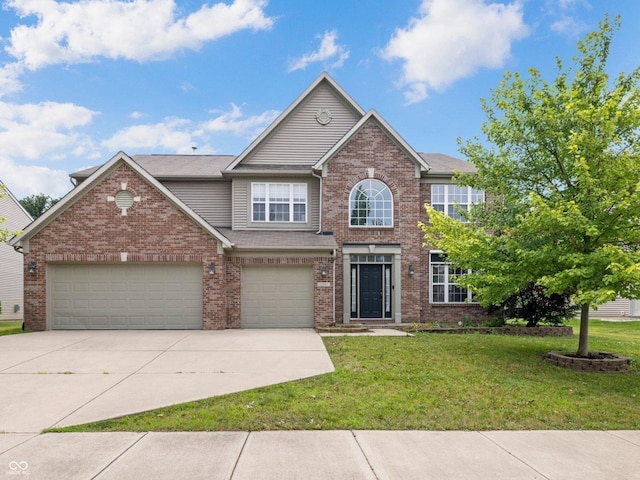12997 Bartlett Dr, Fishers, IN 46037 - view of front of home featuring concrete driveway, brick siding, and a front lawn