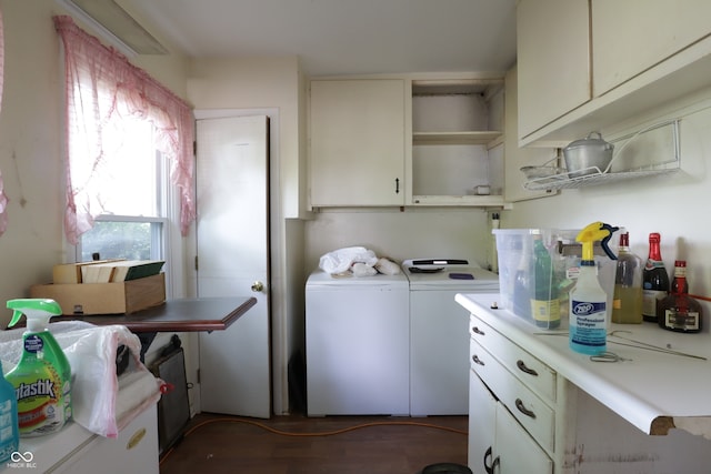 633 N E St, Greenfield, IN 46140 - washroom featuring washing machine and clothes dryer, cabinet space, and wood finished floors