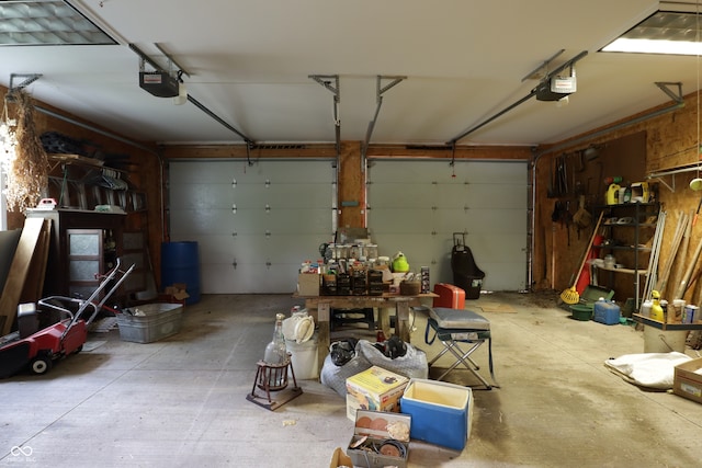 633 N E St, Greenfield, IN 46140 - garage featuring a garage door opener