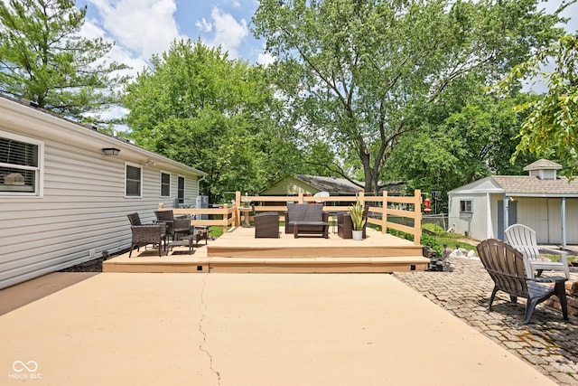 6429 Walnut Way, Brownsburg, IN 46112 - view of patio / terrace with outdoor dining area, a wooden deck, and an outbuilding