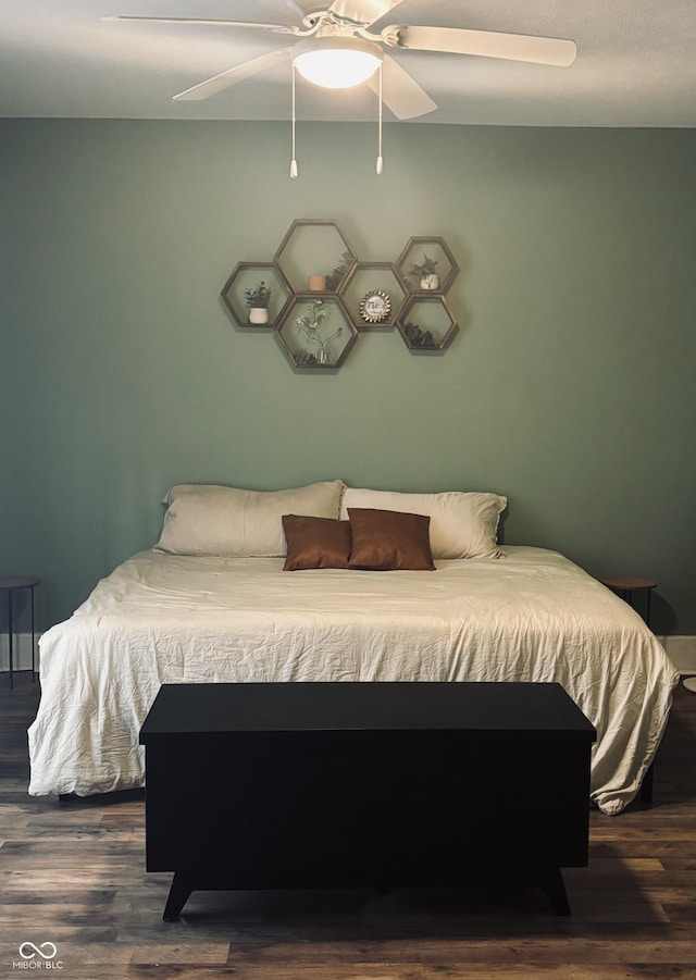 597 W Adams St, Franklin, IN 46131 - bedroom with wood finished floors and ceiling fan
