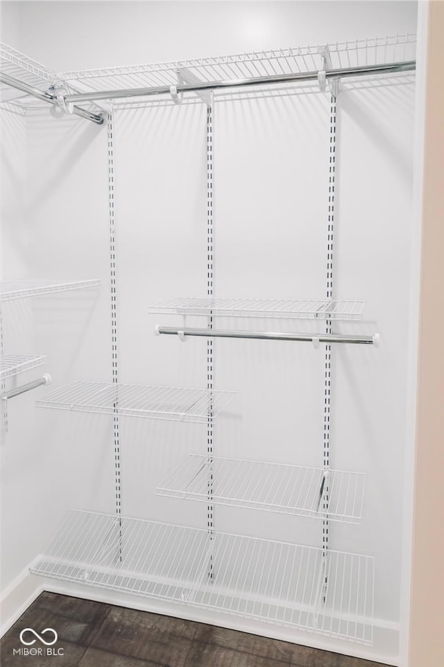 597 W Adams St, Franklin, IN 46131 - walk in closet with wood finished floors