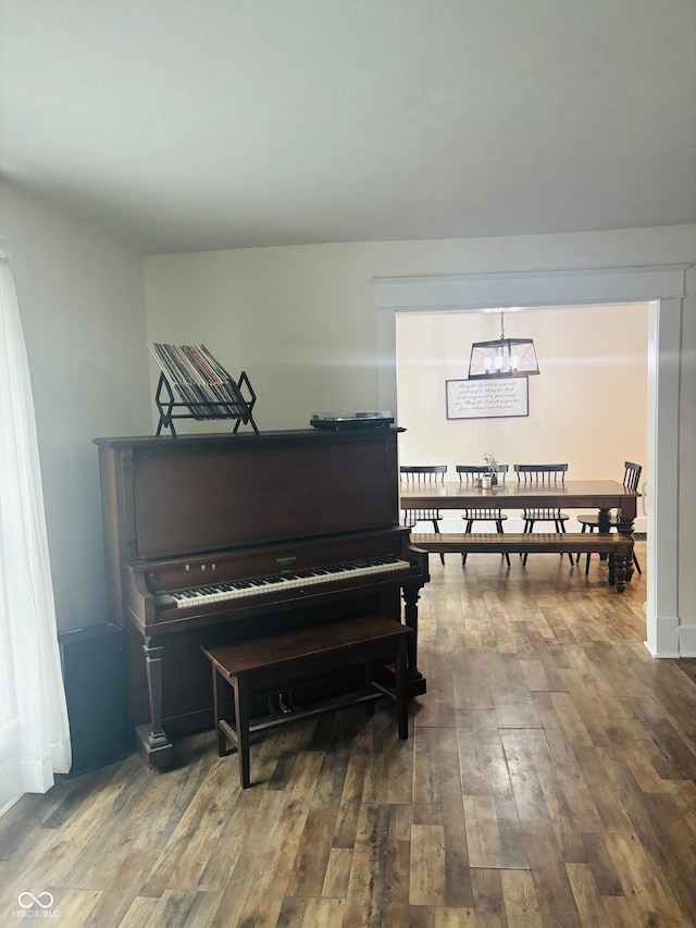 597 W Adams St, Franklin, IN 46131 - living area with wood finished floors and a chandelier