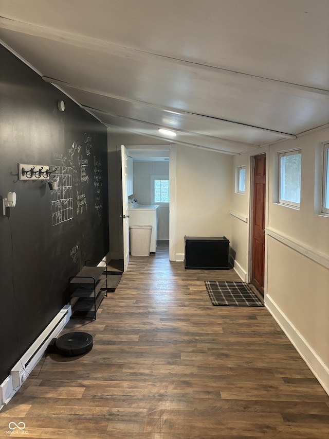 597 W Adams St, Franklin, IN 46131 - basement featuring washer / dryer, wood finished floors, a baseboard heating unit, and plenty of natural light