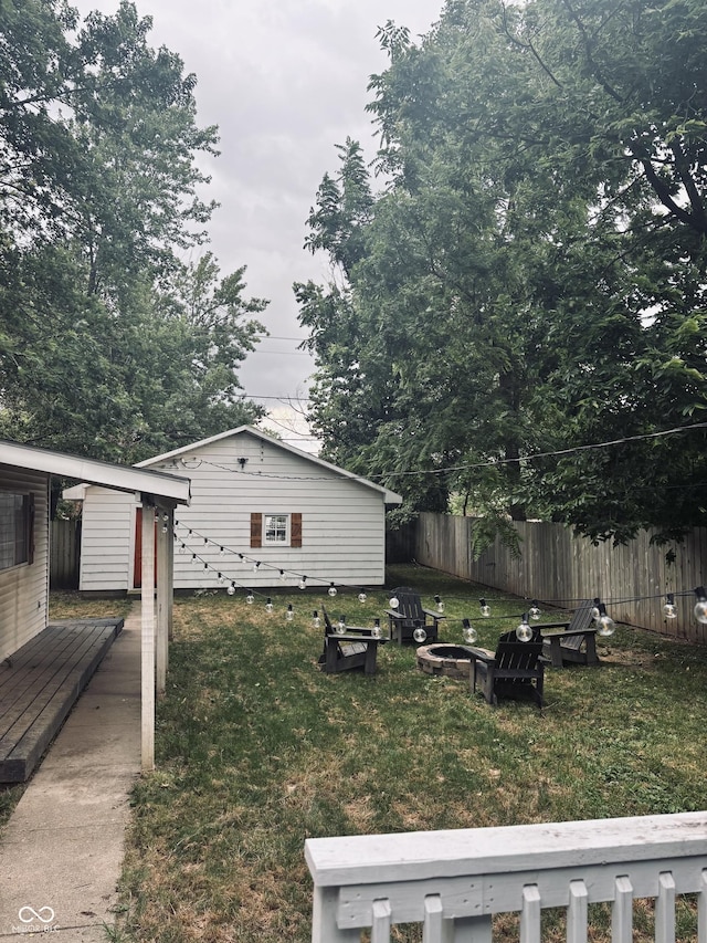 597 W Adams St, Franklin, IN 46131 - view of yard with a wooden deck and an outdoor structure
