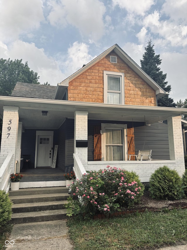 597 W Adams St, Franklin, IN 46131 - view of front of house with a porch