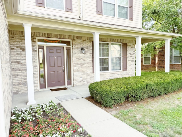 2444 Cole Branch Ct, Indianapolis, IN 46239 - view of exterior entry with brick siding and covered porch