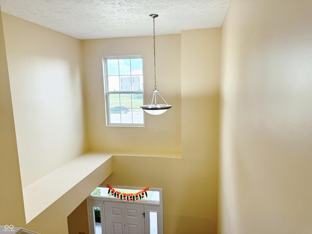2444 Cole Branch Ct, Indianapolis, IN 46239 - unfurnished dining area with a textured ceiling