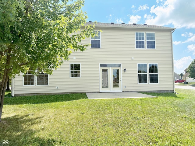 2444 Cole Branch Ct, Indianapolis, IN 46239 - rear view of house with a patio and a lawn