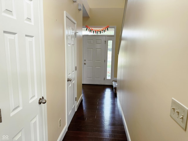 2444 Cole Branch Ct, Indianapolis, IN 46239 - foyer entrance featuring dark wood-style flooring and baseboards