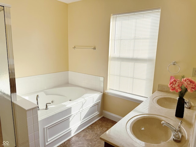 2444 Cole Branch Ct, Indianapolis, IN 46239 - bathroom with a jetted tub, double vanity, and a shower with door