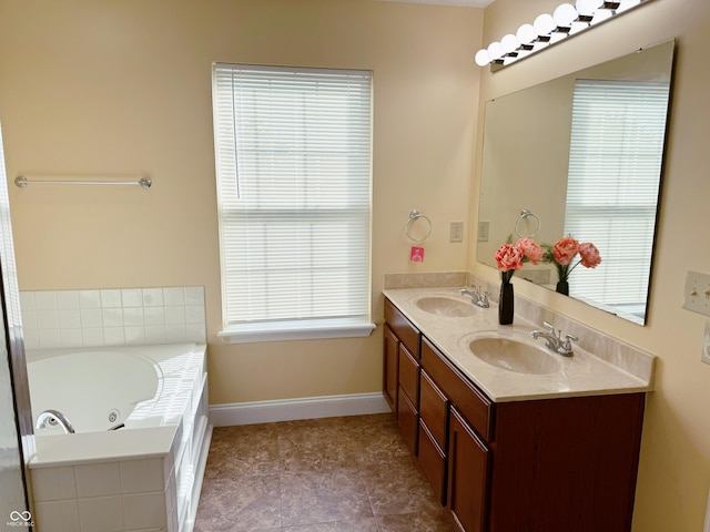 2444 Cole Branch Ct, Indianapolis, IN 46239 - bathroom with double vanity, a tub with jets, and plenty of natural light