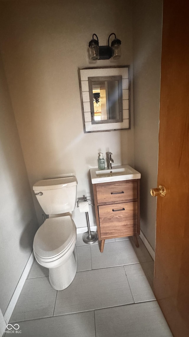 336 Brookside Ln, Plainfield, IN 46168 - half bathroom with vanity and tile patterned flooring