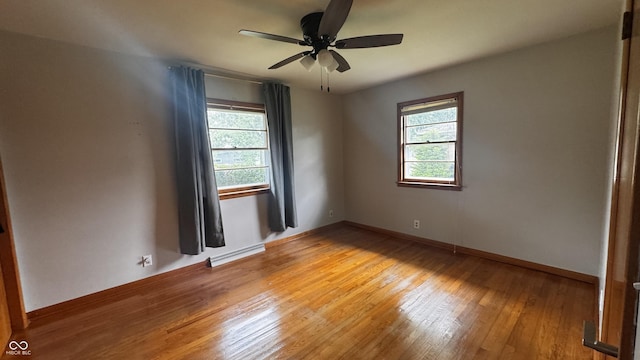 336 Brookside Ln, Plainfield, IN 46168 - spare room featuring healthy amount of natural light, light wood-style floors, and ceiling fan