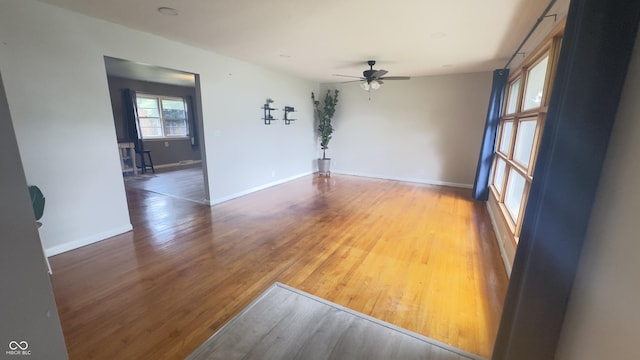 336 Brookside Ln, Plainfield, IN 46168 - unfurnished room with a ceiling fan and wood finished floors