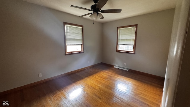 336 Brookside Ln, Plainfield, IN 46168 - empty room with wood finished floors and a ceiling fan