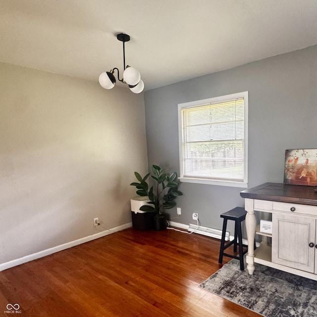 336 Brookside Ln, Plainfield, IN 46168 - office area with a chandelier and dark wood-style floors