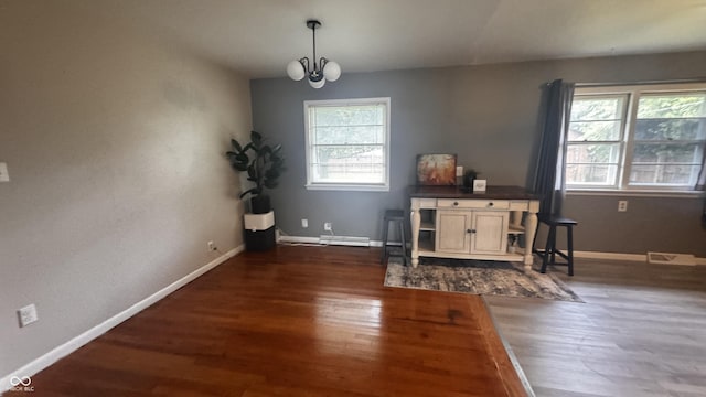 336 Brookside Ln, Plainfield, IN 46168 - sitting room with dark wood-style flooring and a chandelier