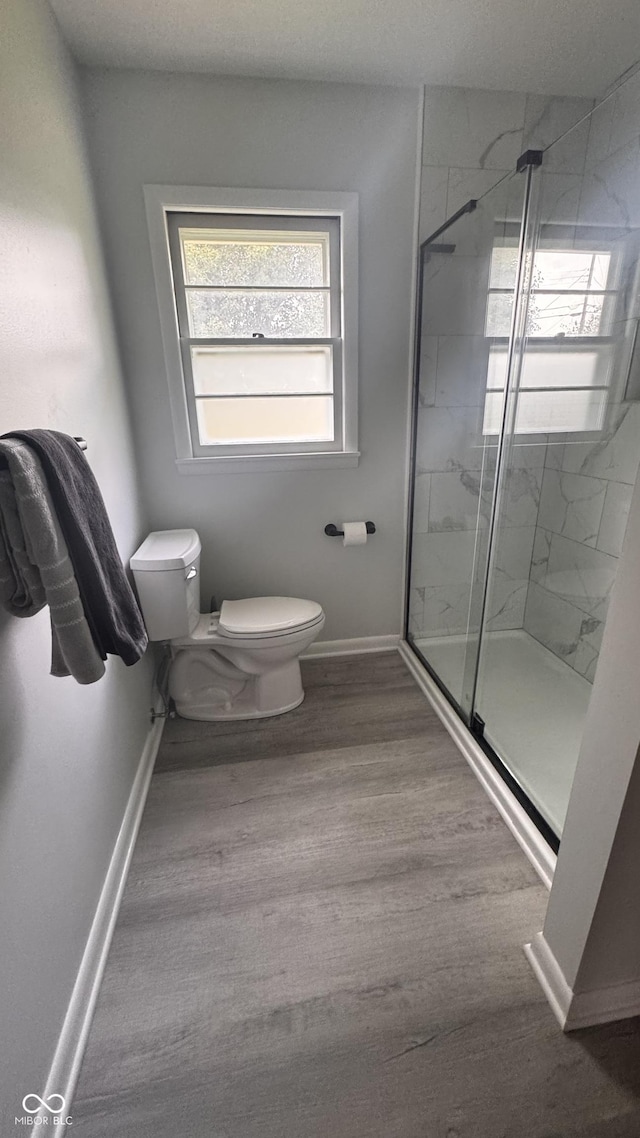 336 Brookside Ln, Plainfield, IN 46168 - full bathroom featuring a stall shower and wood finished floors