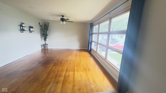 336 Brookside Ln, Plainfield, IN 46168 - unfurnished room with light wood-style floors and ceiling fan