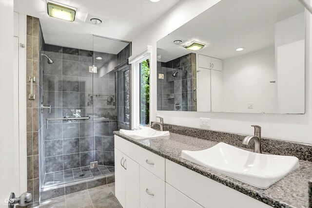 944 Briar Patch Ln, Greenwood, IN 46142 - bathroom with double vanity, a shower stall, and recessed lighting