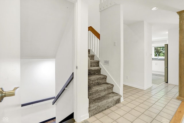 944 Briar Patch Ln, Greenwood, IN 46142 - stairs featuring tile patterned floors, recessed lighting, and decorative columns