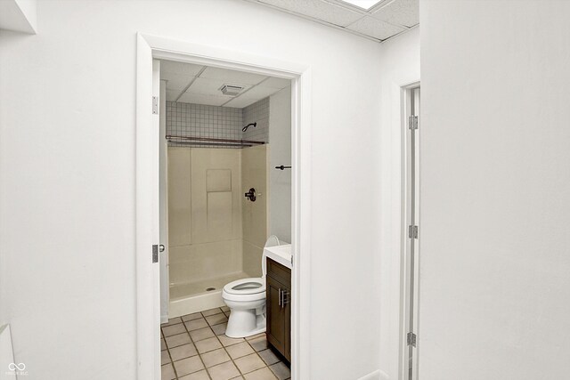 944 Briar Patch Ln, Greenwood, IN 46142 - bathroom with a drop ceiling, tile patterned floors, a stall shower, and vanity