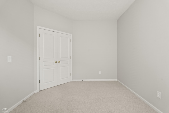 13172 Duval Dr, Fishers, IN 46037 - unfurnished bedroom featuring light colored carpet and baseboards
