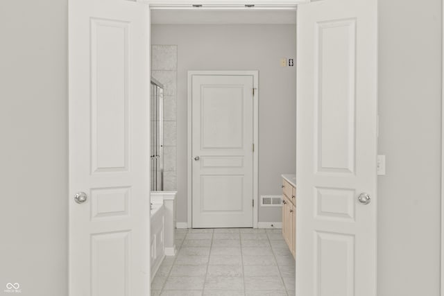 13172 Duval Dr, Fishers, IN 46037 - full bathroom with vanity and tile patterned flooring