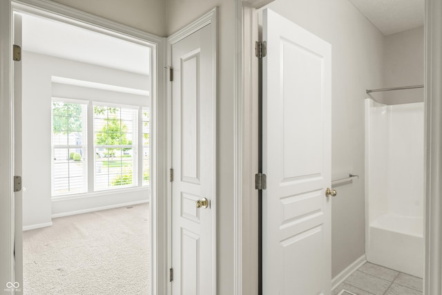 13172 Duval Dr, Fishers, IN 46037 - hallway with baseboards and light carpet