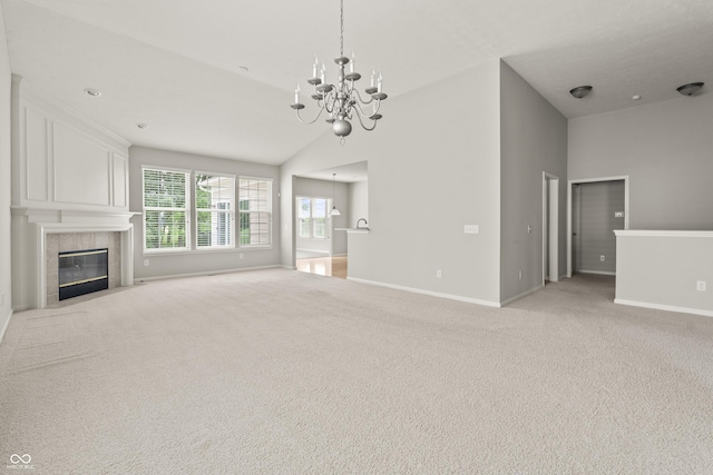13172 Duval Dr, Fishers, IN 46037 - unfurnished living room featuring a chandelier, light carpet, high vaulted ceiling, and a fireplace