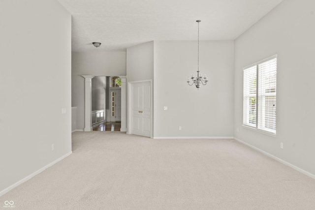 13172 Duval Dr, Fishers, IN 46037 - spare room featuring light carpet and a chandelier