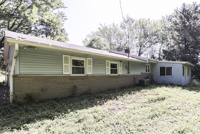 6637 E County Road 600 S, Plainfield, IN 46168 - view of home's exterior with brick siding and a cooling unit