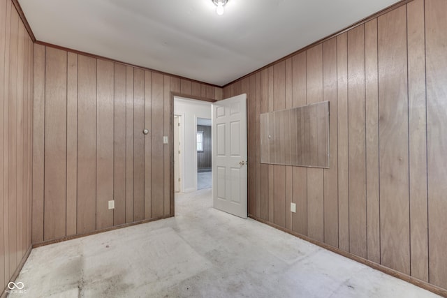 6637 E County Road 600 S, Plainfield, IN 46168 - empty room with wood walls and concrete flooring