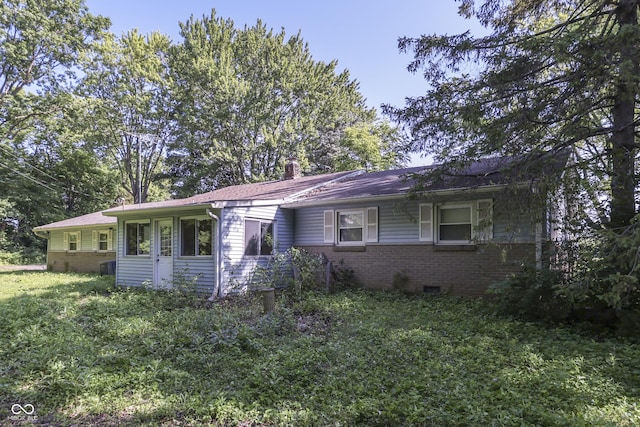 6637 E County Road 600 S, Plainfield, IN 46168 - single story home with brick siding, a chimney, and a front yard
