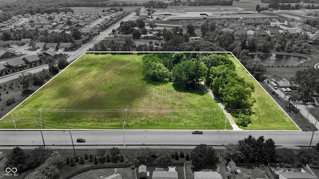 6637 E County Road 600 S, Plainfield, IN 46168 - aerial perspective of suburban area with property parcel outlined and a large body of water