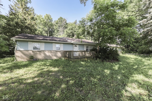 6637 E County Road 600 S, Plainfield, IN 46168 - back of house featuring a wooden deck, a lawn, and brick siding