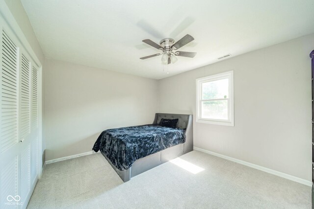 901 N Greenbriar Rd, Muncie, IN 47304 - bedroom with carpet, ceiling fan, and a closet