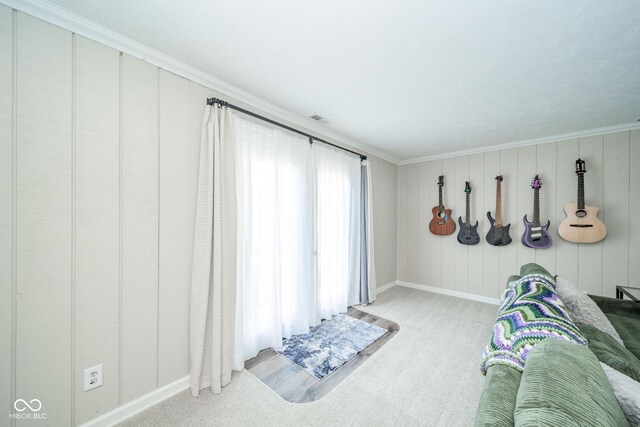 901 N Greenbriar Rd, Muncie, IN 47304 - rec room featuring carpet and ornamental molding