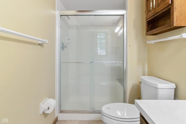 8439 Goldfinch Cir, Indianapolis, IN 46256 - full bathroom featuring vanity, a stall shower, and tile patterned floors
