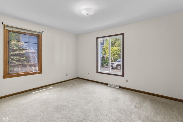 8439 Goldfinch Cir, Indianapolis, IN 46256 - carpeted spare room featuring baseboards