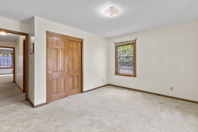 8439 Goldfinch Cir, Indianapolis, IN 46256 - unfurnished bedroom featuring carpet floors and a closet