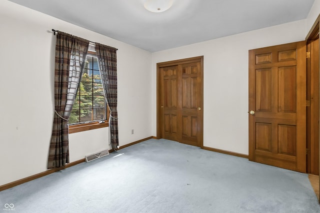 8439 Goldfinch Cir, Indianapolis, IN 46256 - unfurnished bedroom featuring carpet flooring and a closet