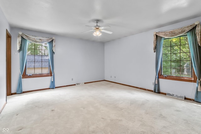 8439 Goldfinch Cir, Indianapolis, IN 46256 - carpeted spare room featuring healthy amount of natural light and a ceiling fan