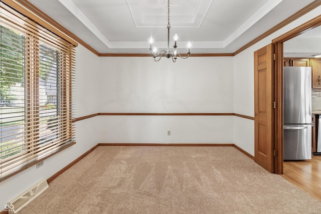 8439 Goldfinch Cir, Indianapolis, IN 46256 - unfurnished dining area featuring a raised ceiling, plenty of natural light, and a chandelier