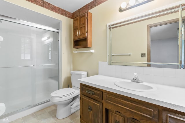 8439 Goldfinch Cir, Indianapolis, IN 46256 - full bath featuring vanity, a stall shower, backsplash, and tile patterned flooring