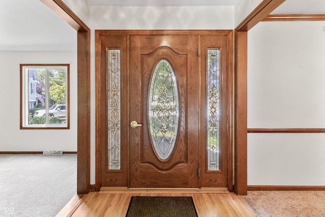 8439 Goldfinch Cir, Indianapolis, IN 46256 - foyer entrance featuring light carpet